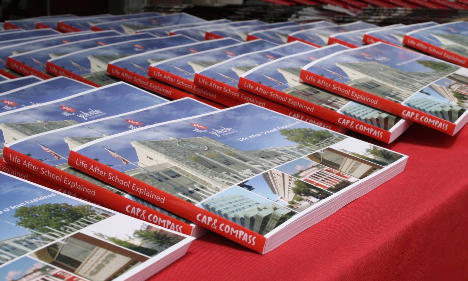 Examples of how the books are distributed at events for students and new hires